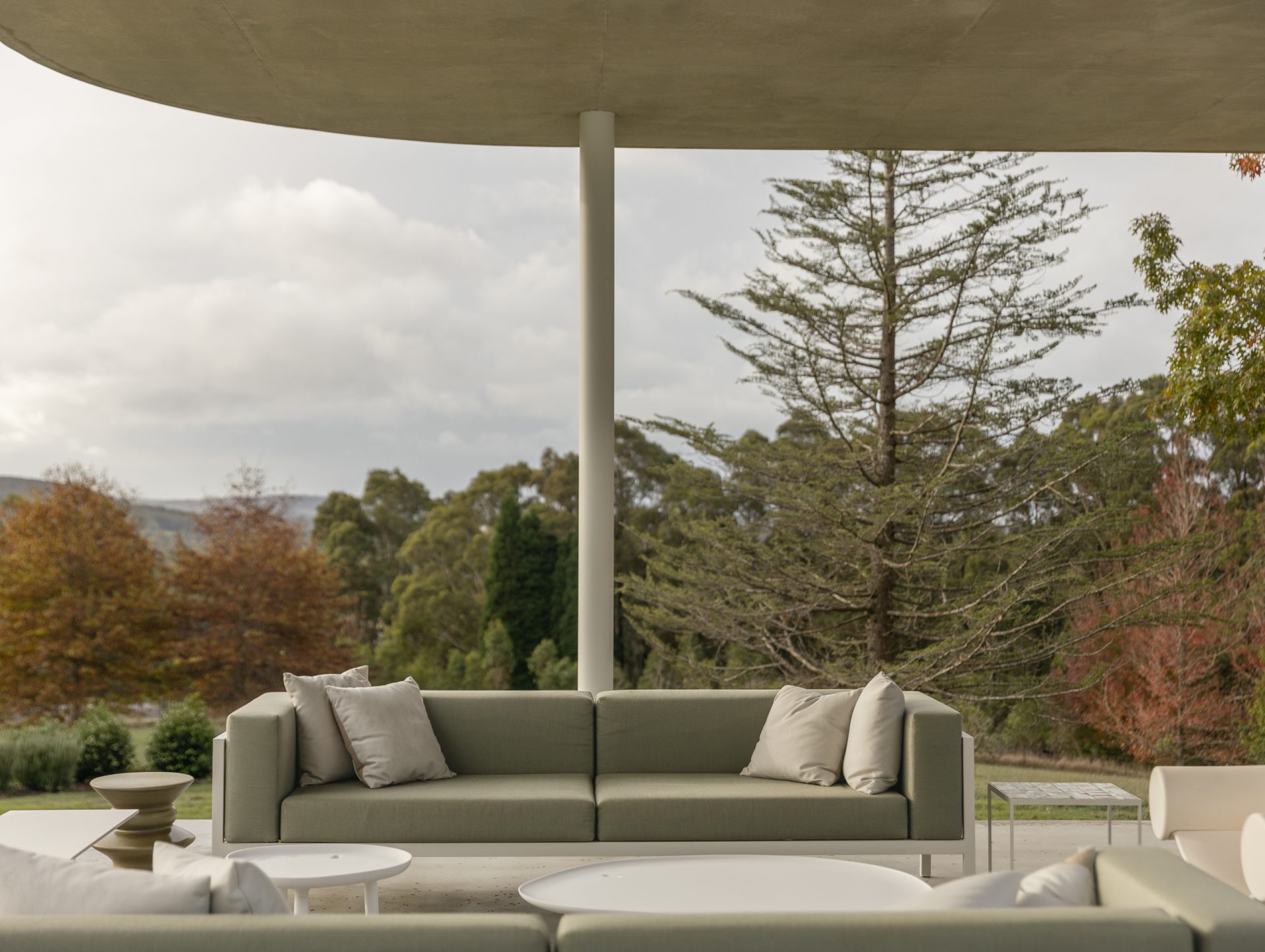 Outdoor lounge terrace at Melody House overlooking the landscape